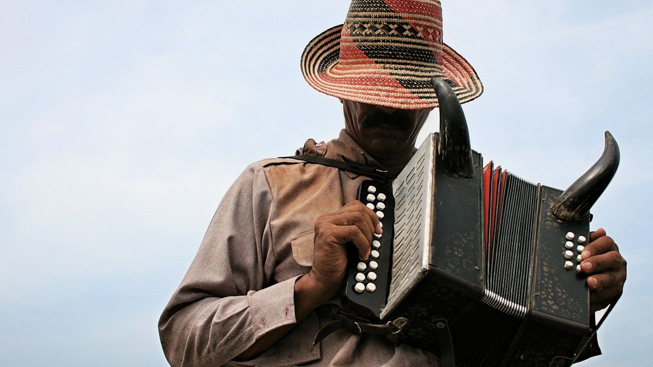 A musician travels a great distance to return an instrument to his elderly teacher. For most of his life, Ignacio Carrillo traveled the villages of northern Colombia, playing traditional songs on his accordion, a legendary instrument said to have once belonged to the devil. He eventually married and settled in a small town, leaving the nomadic life behind. But after the traumatic death of his wife, he vows to never play the accursed accordion again, and embarks on one last journey to return the instrument to its rightful owner. On the way, Ignacio is followed by FermÃ­n, a spirited teenager determined to become his apprentice. Tired of loneliness, Ignacio accepts the young man as his pupil and together they traverse the vast Colombian terrain, discovering the musical diversity of Caribbean culture. Hardened by a life of solitude, Ignacio tries to discourage FermÃ­n from following in his footsteps, but destiny has different plans for them. 